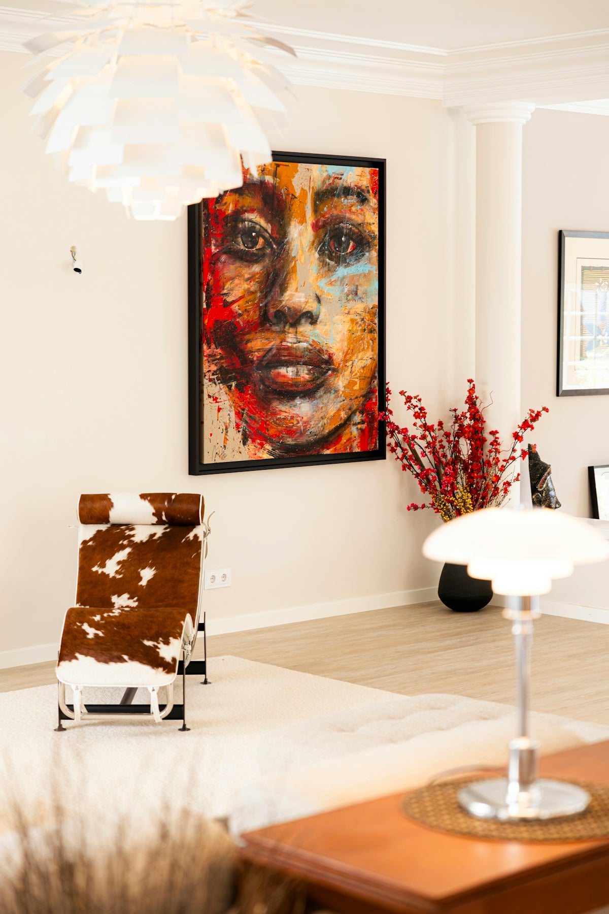 Modern living room decor featuring art and furniture