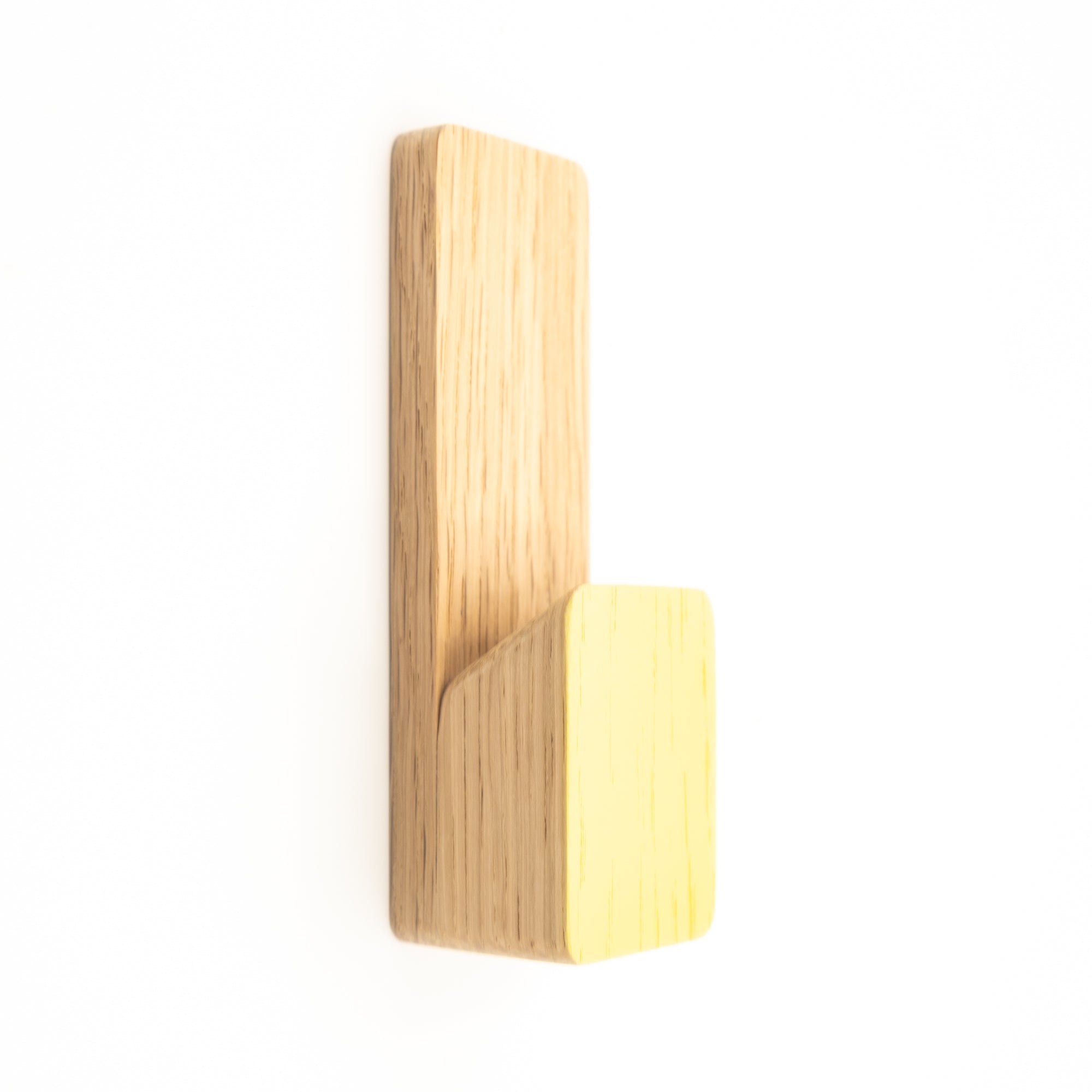 Adhesive  Wooden wall-mounted hook on a white background