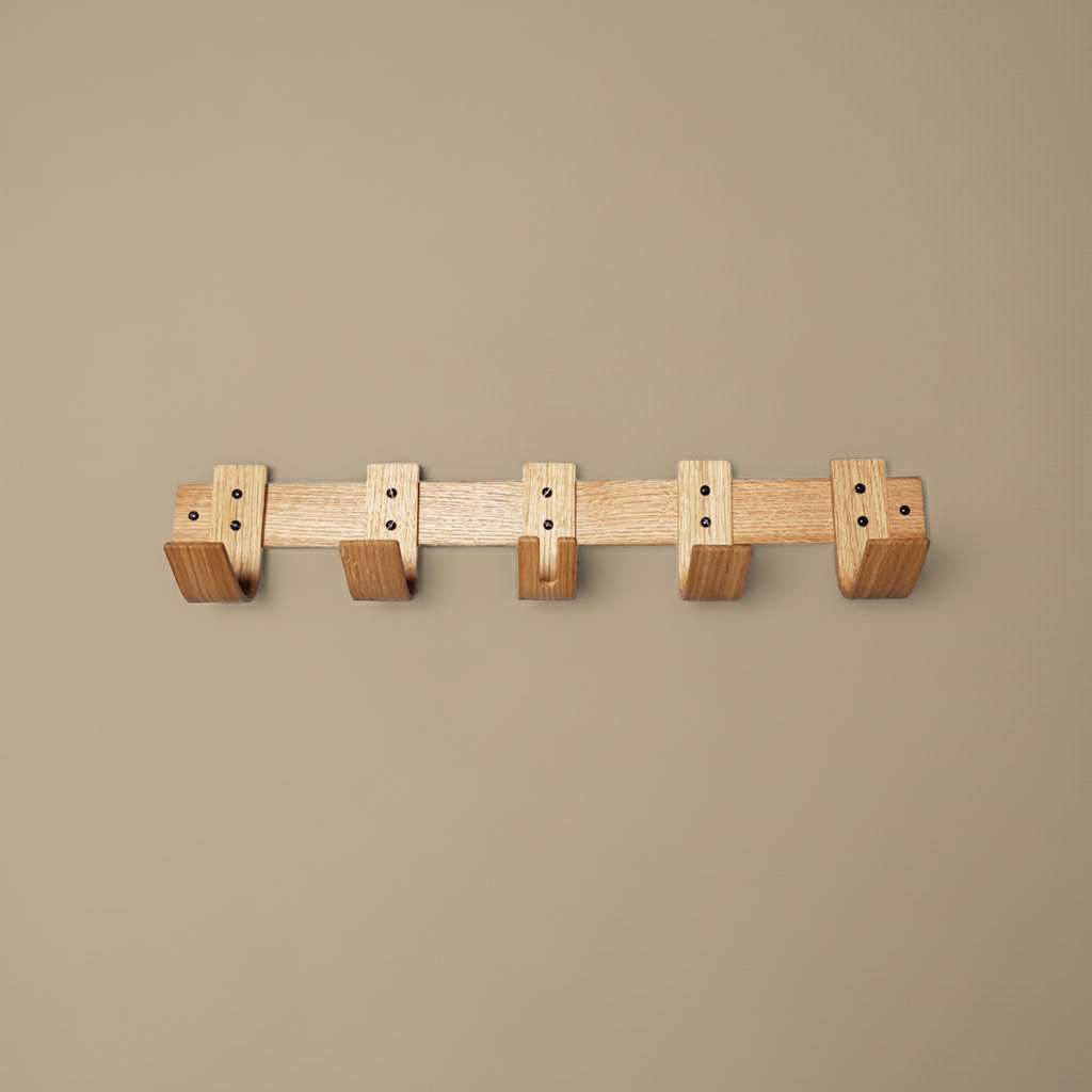 Wooden wall-mounted coat rack on a beige background